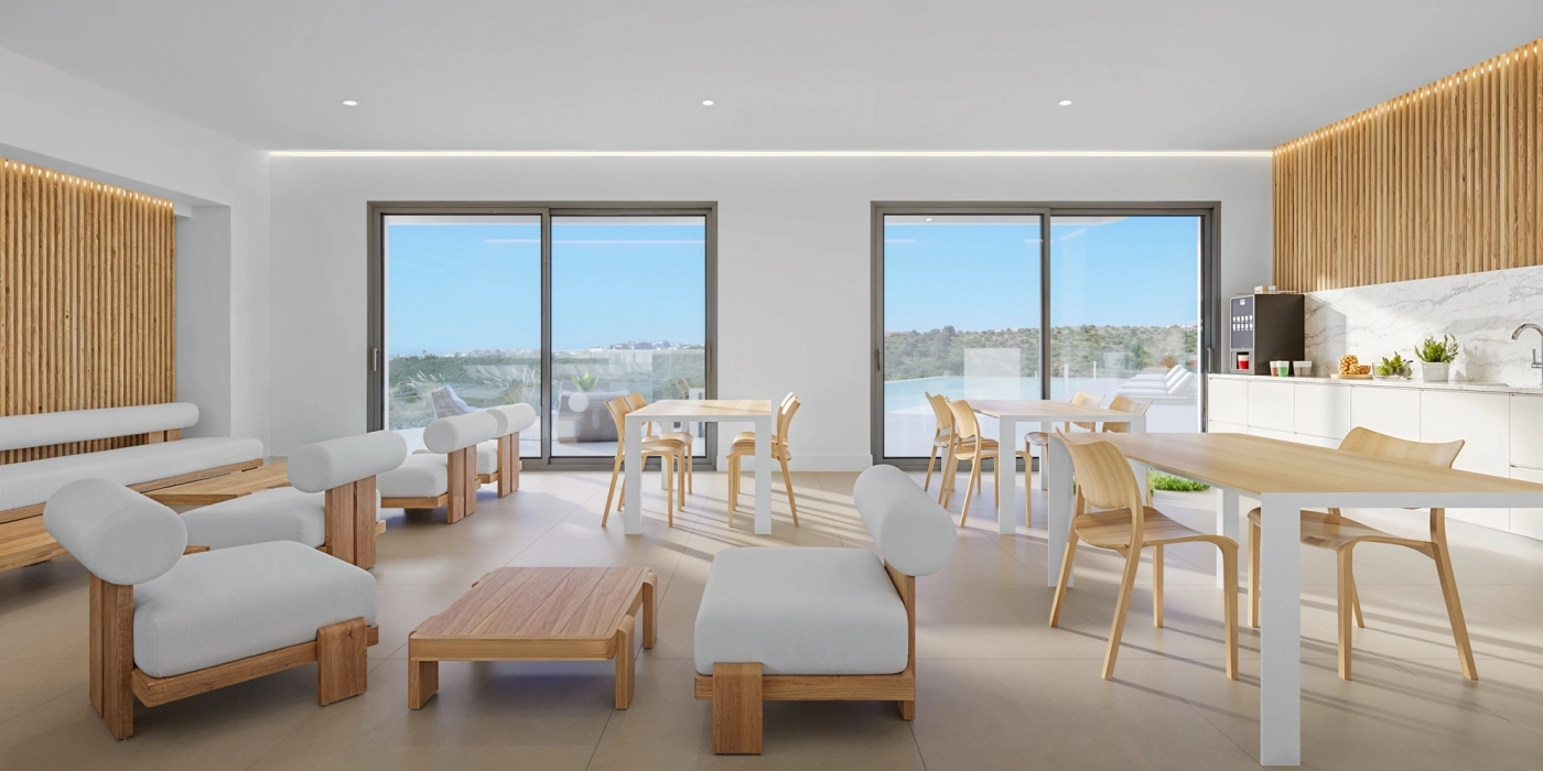 Un cómodo espacio de co-working para que los residentes trabajen o se relajen en un entorno tranquilo y profesional.