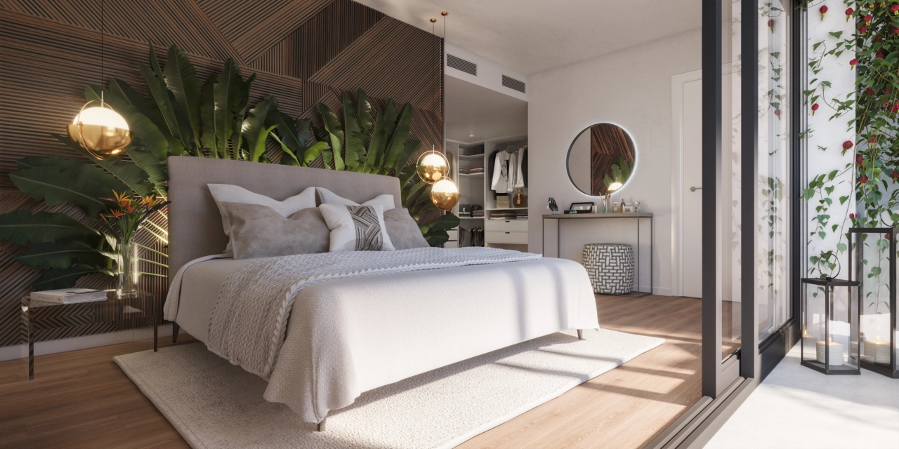 El dormitorio principal es un refugio de paz, con un diseño elegante y acceso directo a los espacios exteriores.