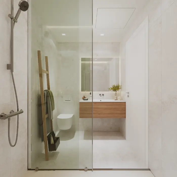 Un baño de invitados contemporáneo con líneas limpias y accesorios modernos para el máximo confort.