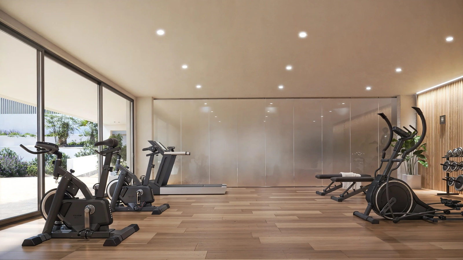 Manténgase activo y saludable en el gimnasio privado y completamente equipado para residentes.