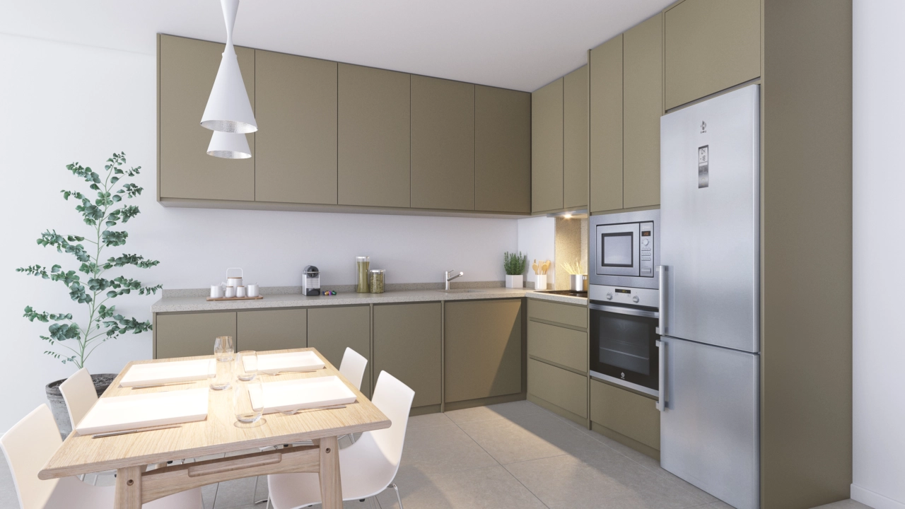 Et fullt utstyrt, moderne kjøkken med hvitevarer av høy kvalitet og stilrene overflater, klart for deg å nyte.