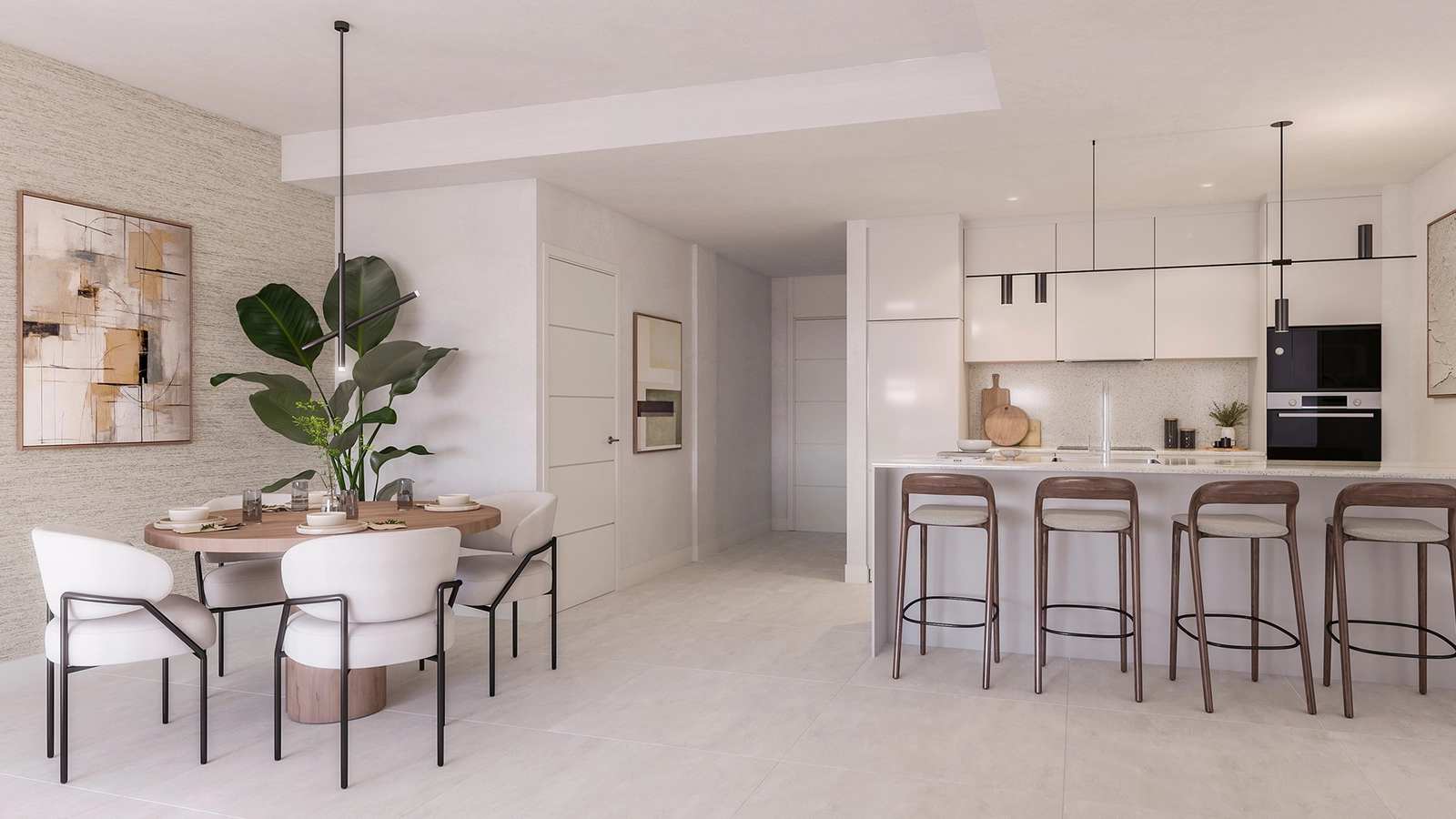 Et åpent kjøkken og spiseplass, fullt utstyrt med hvitevarer av høy kvalitet for en moderne livsstil.