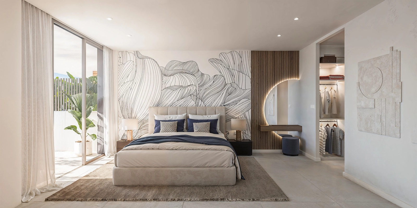 Det elegante hovedsoverommet tilbyr et privat tilfluktssted med direkte tilgang til uterommet og en walk-in garderobe.