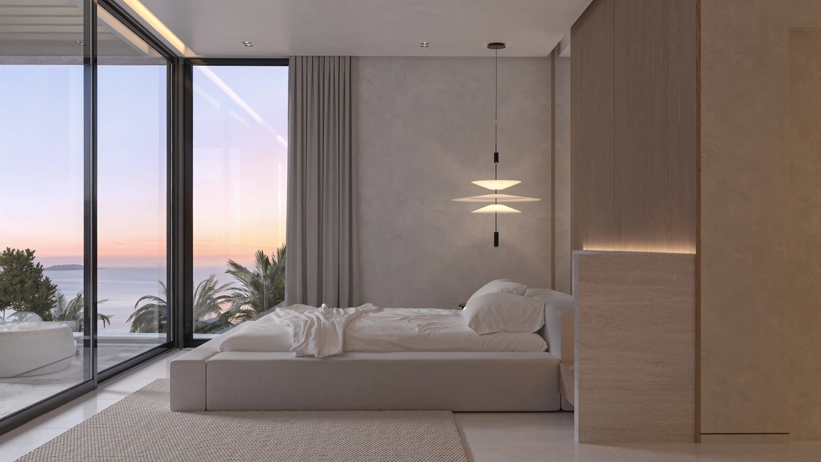 Et rolig og stilfullt soverom med direkte tilgang til en privat terrasse gjennom store glassdører.