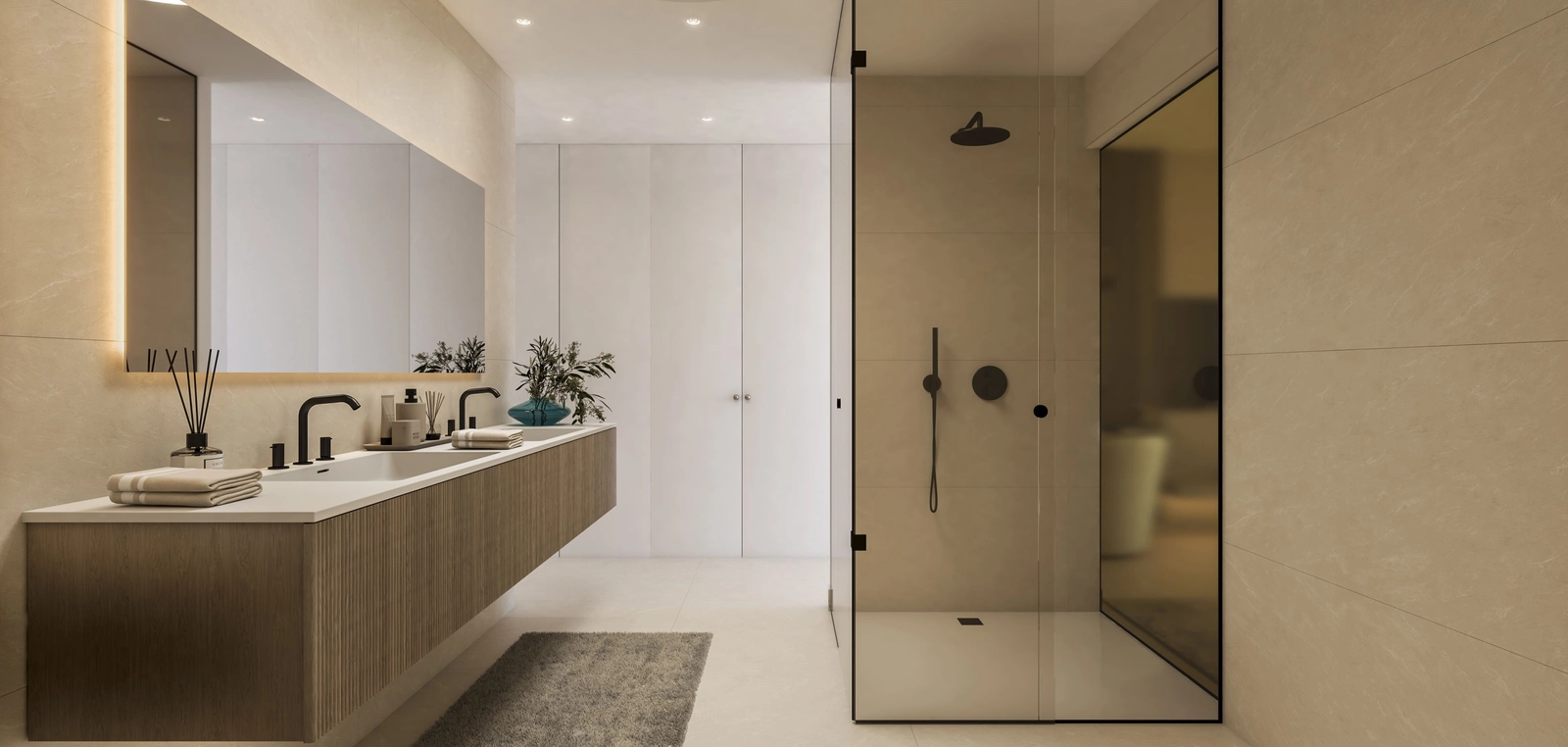 Elegante og moderne bad designet med førsteklasses materialer og overflater for en spa-lignende opplevelse.