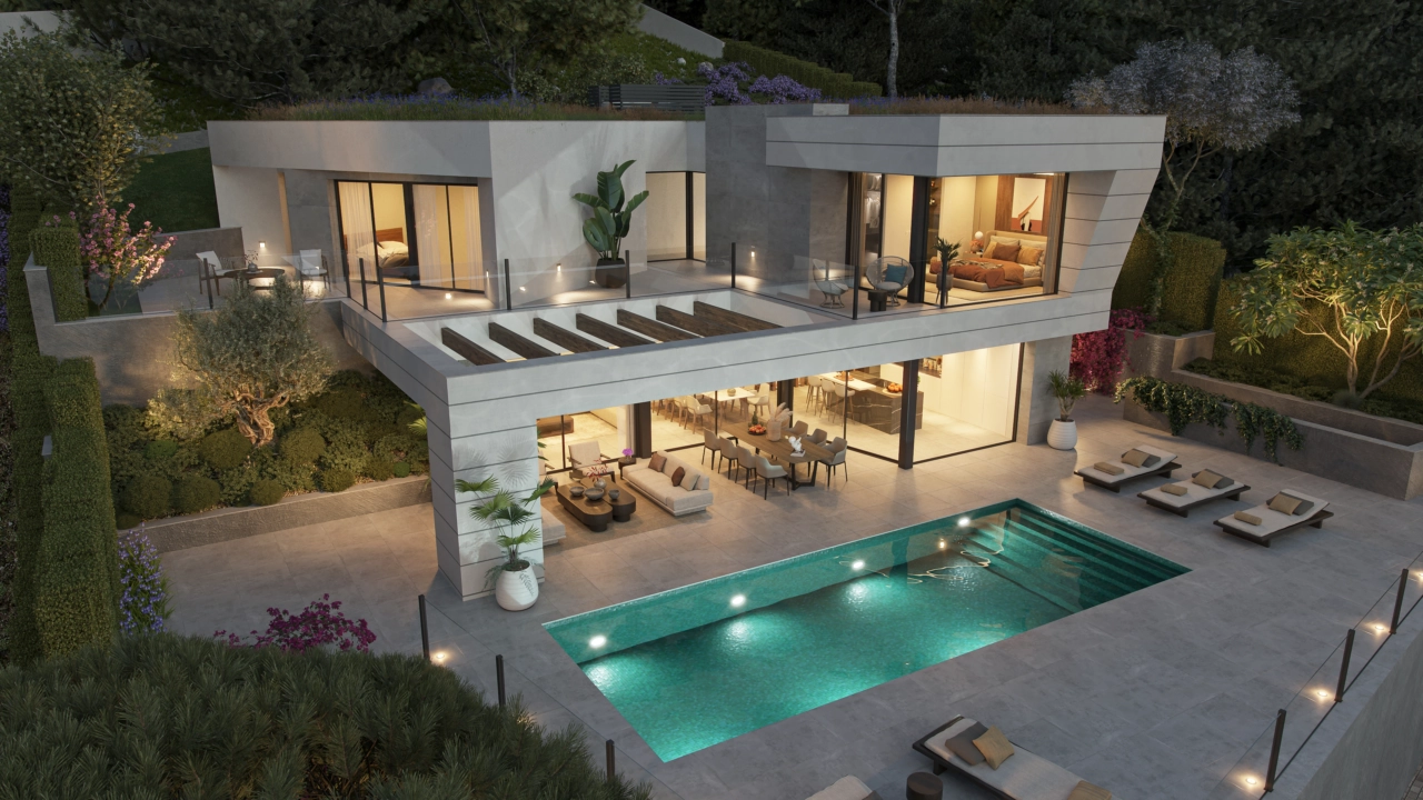 En kveldsutsikt over villaen, hvor elegant belysning skaper en varm og innbydende atmosfære.