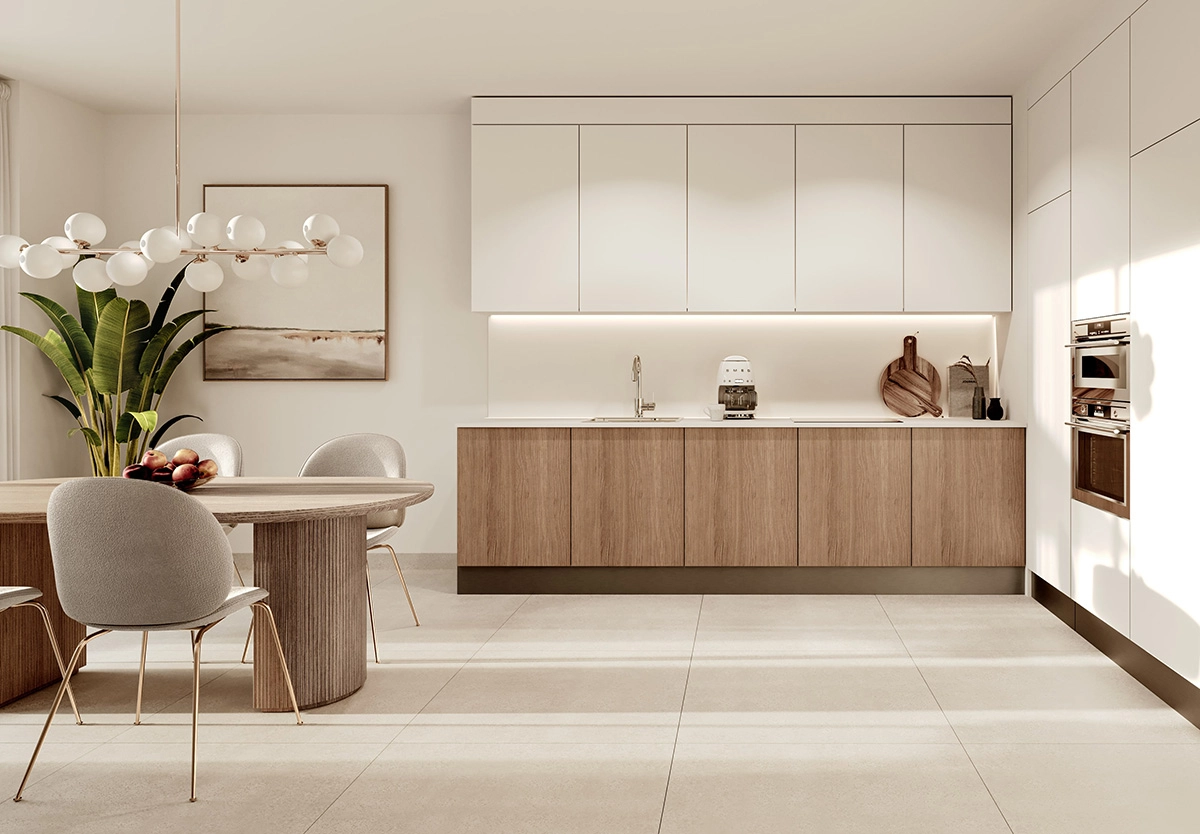 Slanke, åpne kjøkken er fullt utstyrt med hvitevarer og overflater av høy kvalitet.